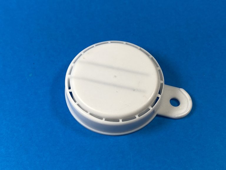 White plastic snap cap